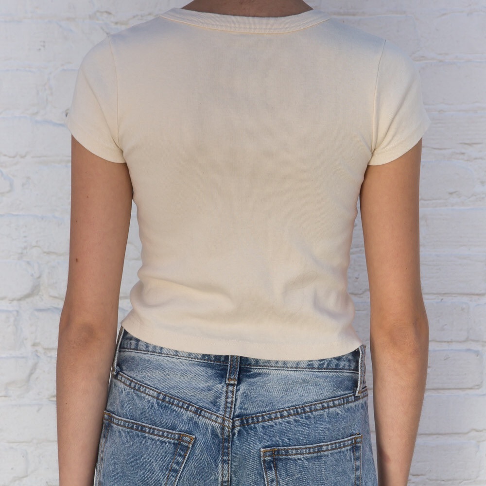SOLD “i don’t care” fairy shirt - brandy melville - Picture 2 of 4